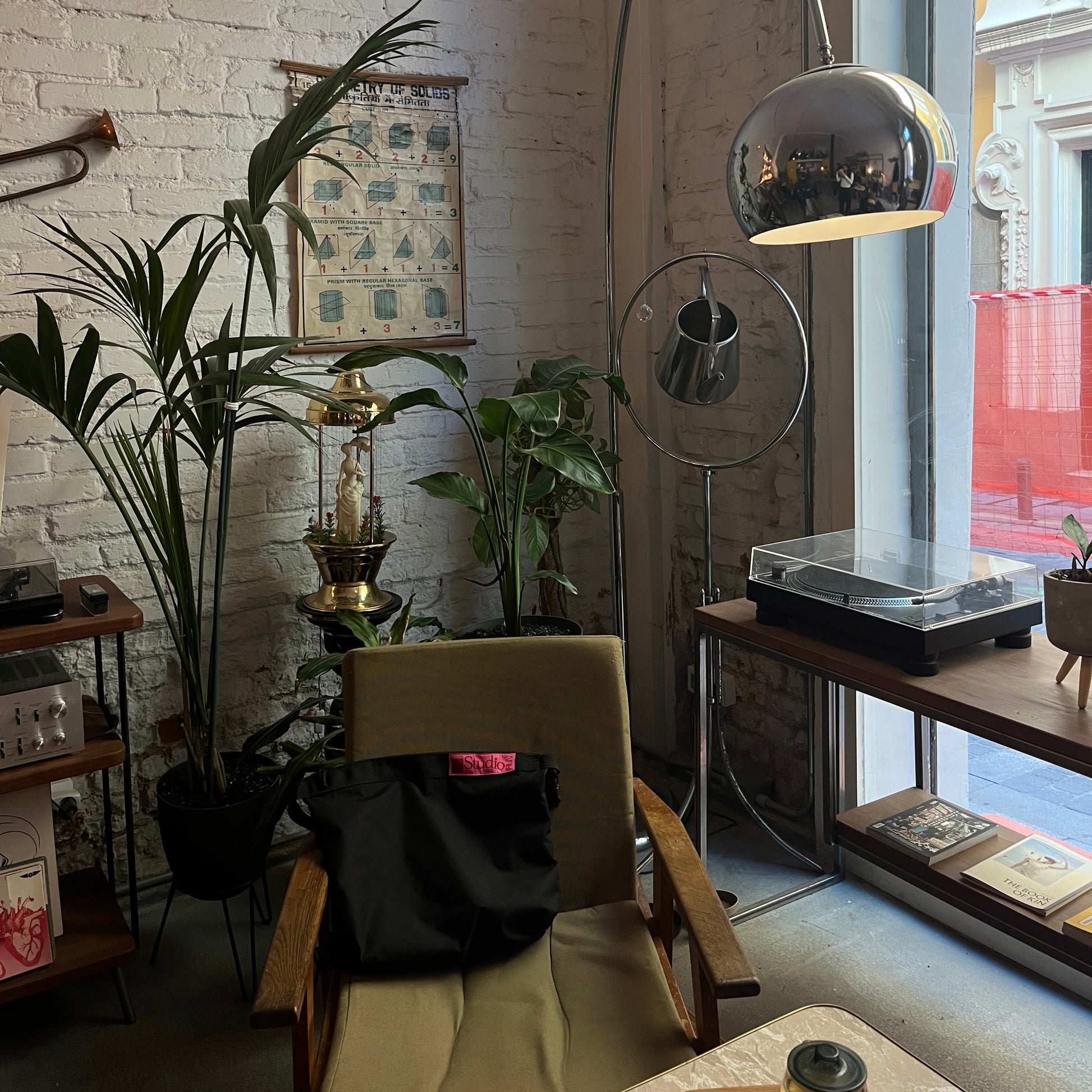 Tano Wrks Studio Run on chair in cafe