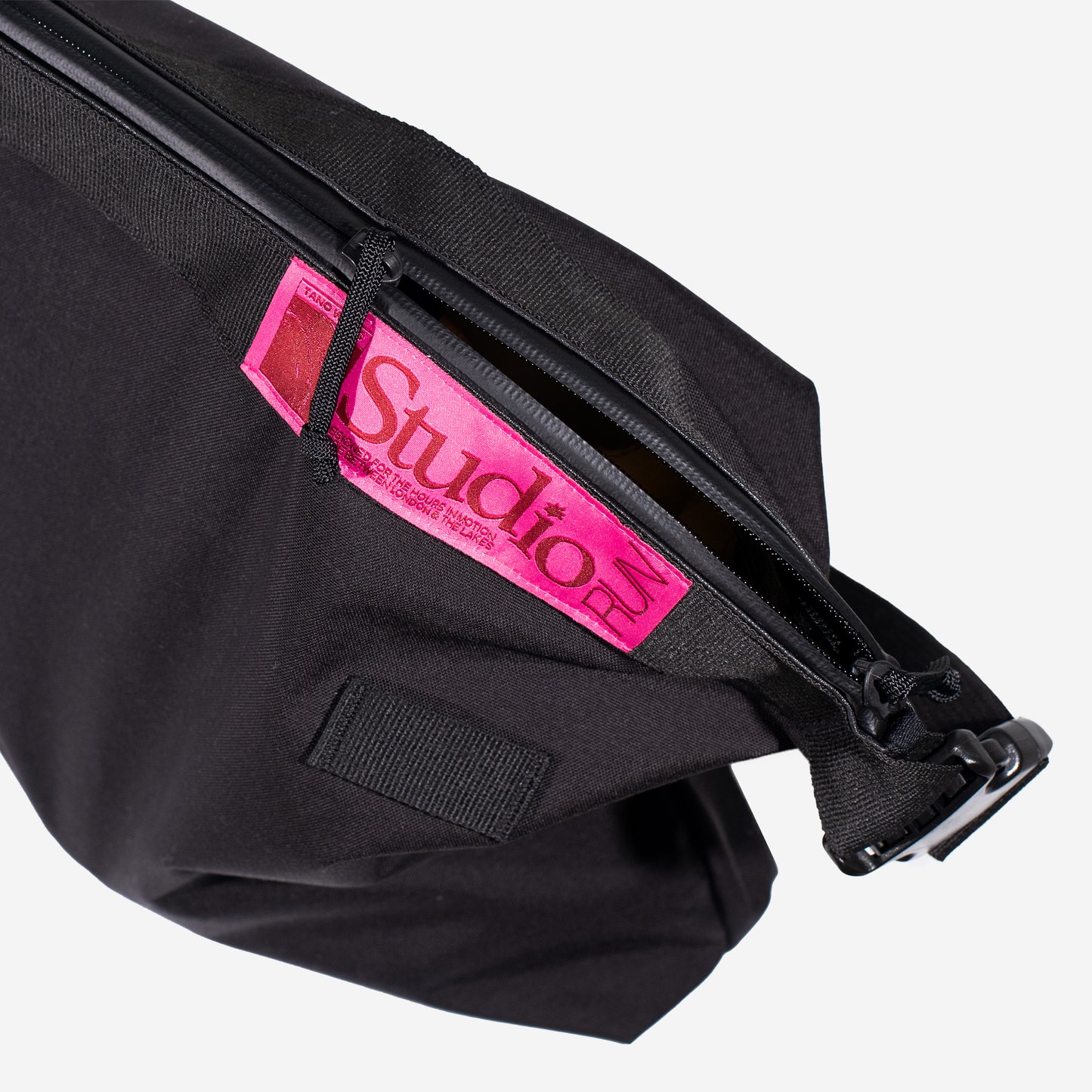 Tano Wrks Studio Run zip and logo